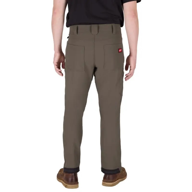 Pracovní kalhoty MILWAUKEE FREEFLEX Stretch, hnědé, Vel. 48/M, 4932502053